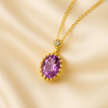 Natural purple amethyst necklace on satin cream background