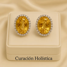 Luxury snake-inspired statement earrings by Curación Holística