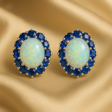 “Handmade opal and sapphire stud earrings in sterling silver – Curación Holística exclusive.”