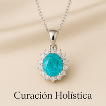 	Elegant tourmaline pendant with sparkly accents on silver chain