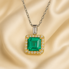“Handmade emerald and white quartz halo necklace in sterling silver and gold, crafted for healing and elegance.”
