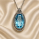 	Large aquamarine oval pendant necklace on cream satin background