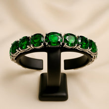 Elegant gift bracelet with spiritual healing properties and rich green tone.