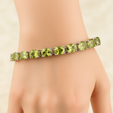Adjustable green peridot bracelet for elegant occasions