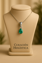 “Healing Stone Necklace with Nano-Emerald Crystal - Curación Holística Exclusive”
	5.	“Sterling Silver Chain with Vibrant Green Nano-Emerald Pendant on Satin Fabric”