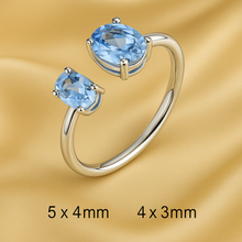 “Close-up of luxury Aquamarine Open Ring with 5x4mm and 4x3mm natural gemstones, exclusive handmade design by Curación Holística.”
