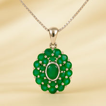 Sterling silver emerald necklace with halo of round-cut stones