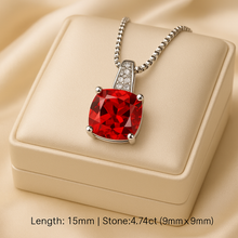 “Elegant boho statement necklace featuring cushion-cut ruby gemstone.”