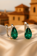 “Exclusive Nano-Emerald earrings, handmade in Spain, healing jewelry crafted with sterling silver and vivid green nano stones.”
