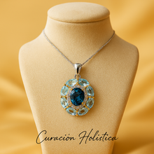 	Curación Holística pendant shown with soft velvet backdrop