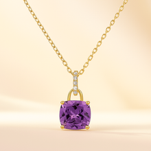Close-up of gold-plated amethyst necklace with white quartz stones
	