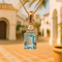 Close-up of sterling silver aquamarine necklace, gemstone cut detail