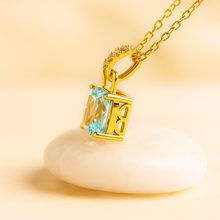 Natural aquamarine pendant with white quartz on model bust