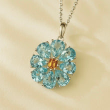 Floral-shaped natural aquamarine pendant with handmade craftsmanship.