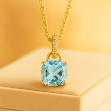 Close-up of cushion-cut aquamarine gemstone pendant