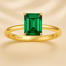 Elegant nano emerald ring on cream luxury box background