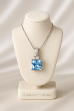 Princess cut aquamarine with baguette white quartz