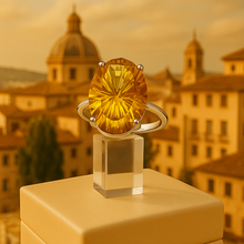 “Artisan at work hand-setting a natural citrine into a sterling-silver mount.putting In Barcelona Spain 