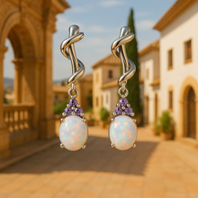 “Close-up of elegant sterling silver earrings featuring healing opal and amethyst gemstones.”