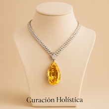 Gift-ready packaging with Curación Holística branding and jewelry care card