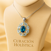 Curación Holística pendant shown with soft velvet backdrop