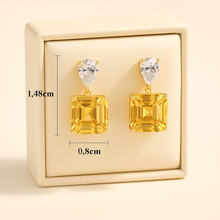 Golden yellow gemstone earrings with white quartz accents