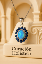 “Sterling silver necklace with ethereal opal and sapphire stones by Curación Holística, exclusive artisan craftsmanship.”