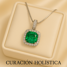 Jewelry box with pendant labeled Curación Holística