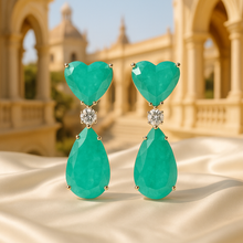 Pear-shaped Paraiba drop stone with silver prong setting