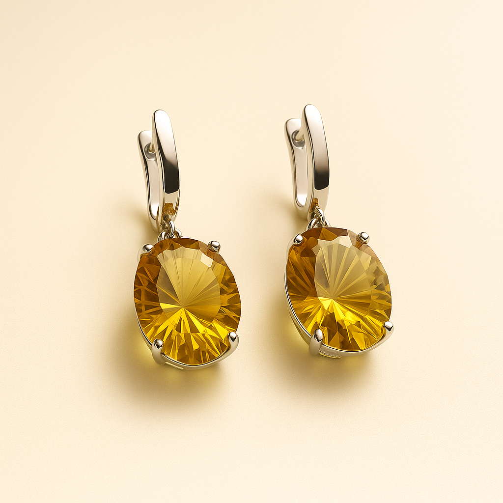	Artisan-crafted yellow gemstone earrings in solid silver