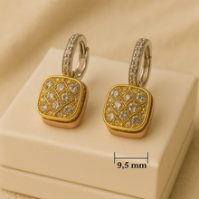 Bold designer earrings with diamond-pattern quartz crystals